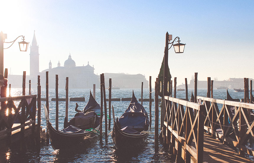 Gondalas in Venice overlooking the basilica, Italy