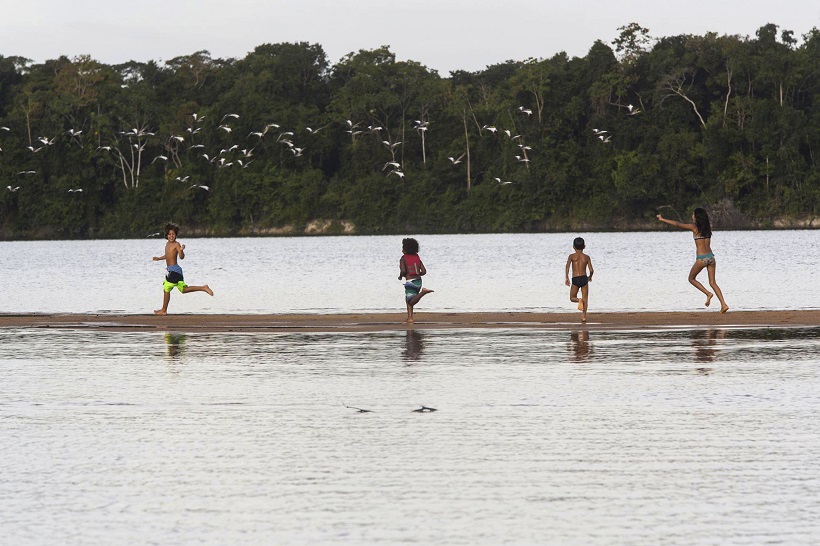 kids at the beach in Brazil