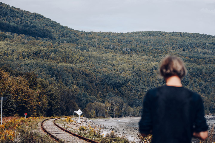 Man seen from the back out in the countryside