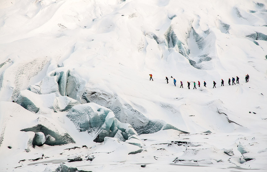 Group hiking on a glacier in Iceland