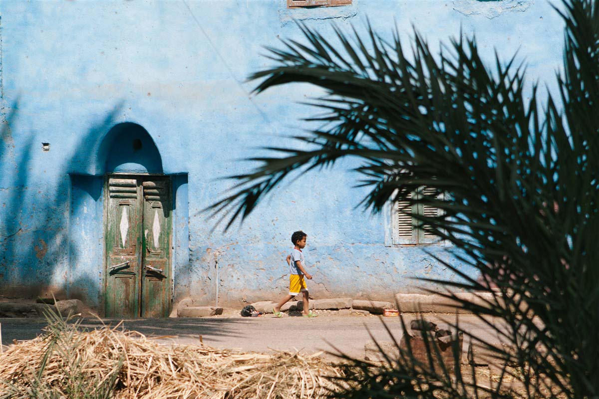 Kid walking in a street - Egypt
