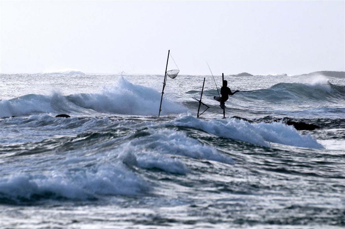 Fisherman and wild sea - Sri Lanka