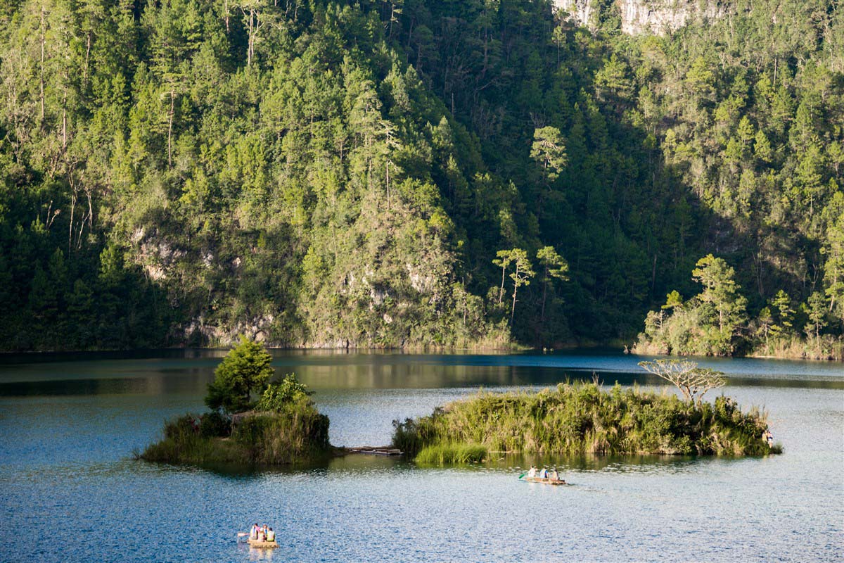 Padding a canoe on a lake - Mexico