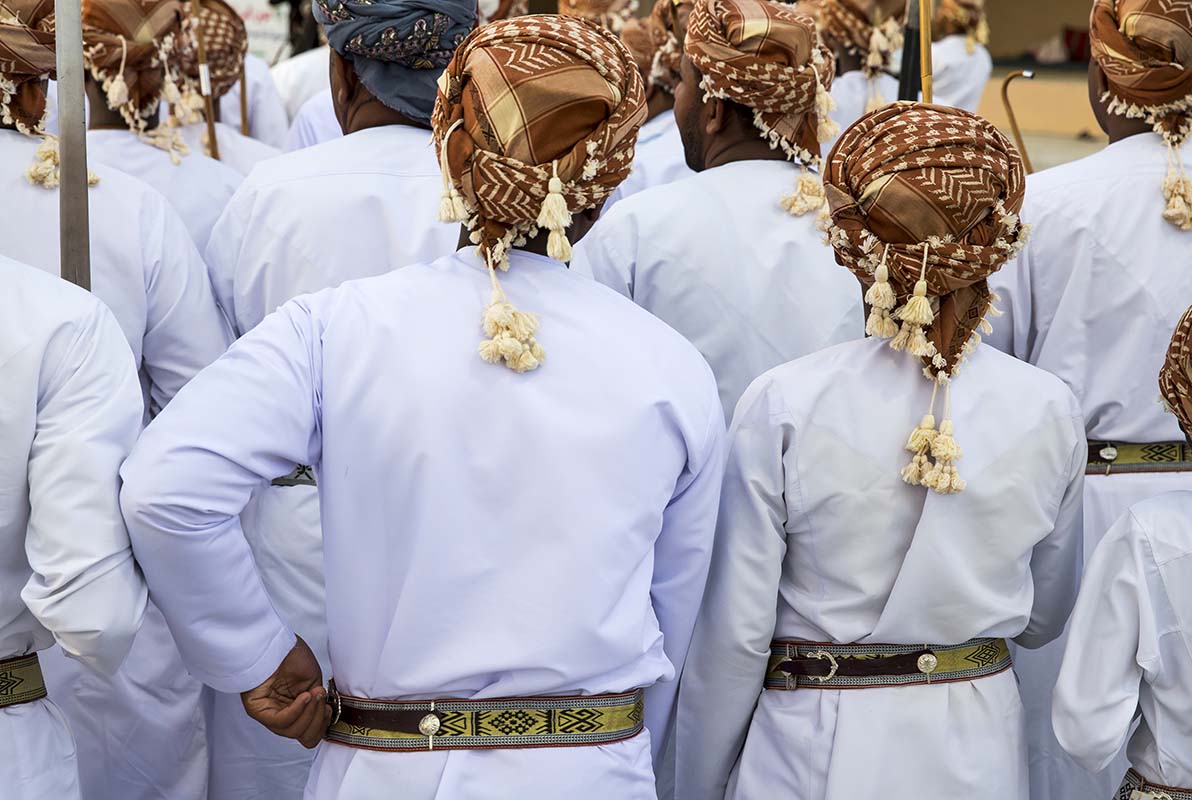 Oman men in traditional clothing - Oman
